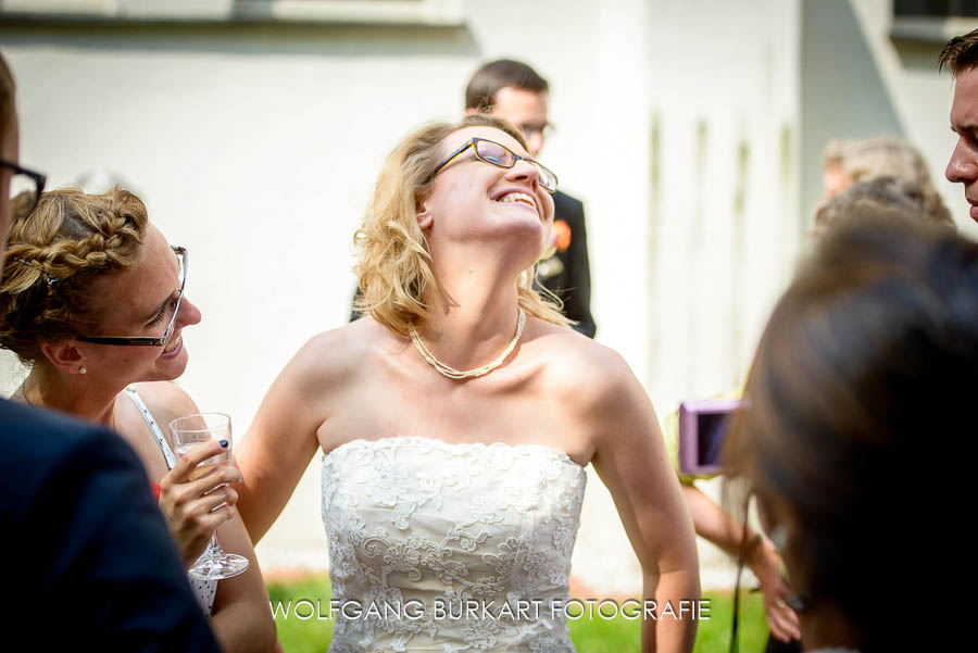 Hochzeit Fotograf München Schwabing, lachende Braut